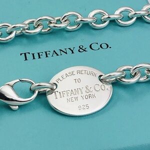 Tiffany’s & Co. Oval Tag Choker 925 sterling silver with pouch & bag included.